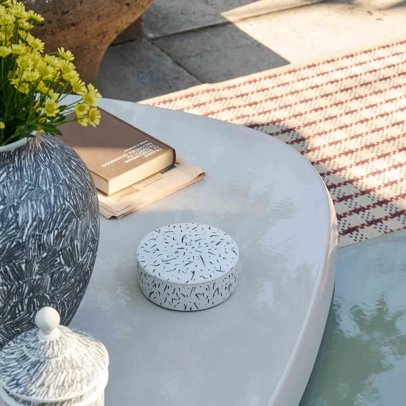 Outdoor Coffee Table MEXIQUE, designed by Charlotte Perriand for Cassina